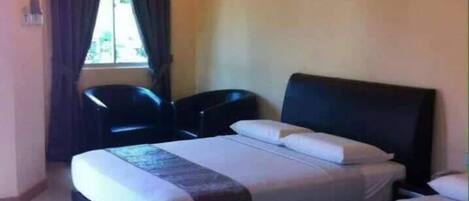 Family Room | Desk, bed sheets