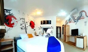 Chambre Deluxe | Literie de qualité, minibar, coffre-fort, bureau