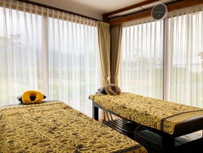 A room with two beds, a clock, and sheer curtains. - Pondanu Cabins By The Lake (Baturiti)