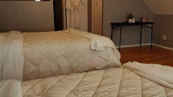 1 bedroom, desk, iron/ironing board, travel crib