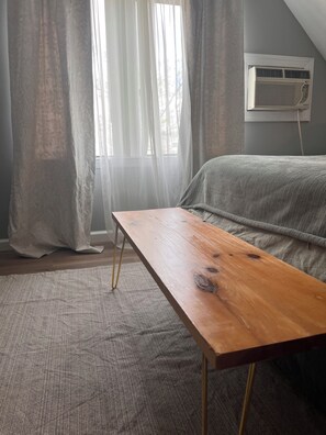 1 bedroom, desk, iron/ironing board, travel crib