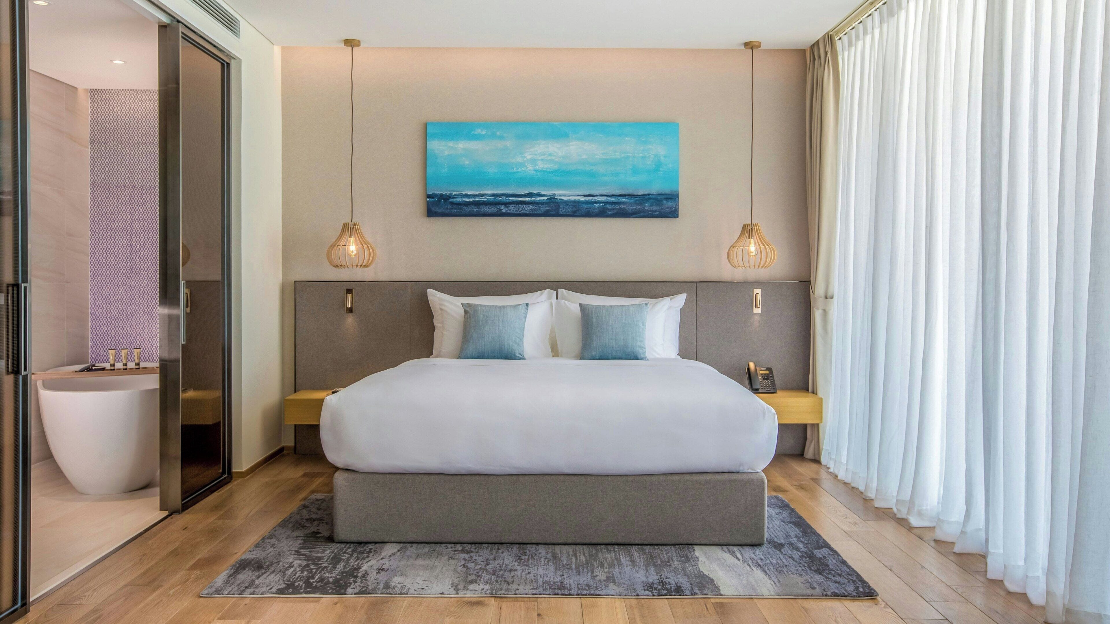 Junior Suite, Ocean View | Premium bedding, minibar, individually decorated, individually furnished
