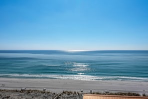 On the beach, sun loungers, beach towels