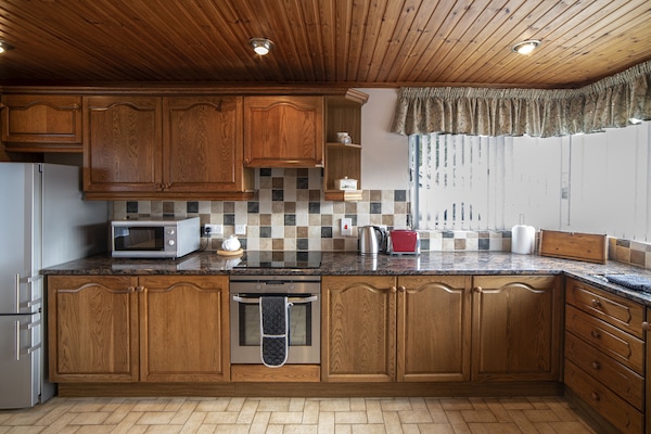 Fridge/freezer, dishwasher and all the kitchen tools needed to cook and bake.