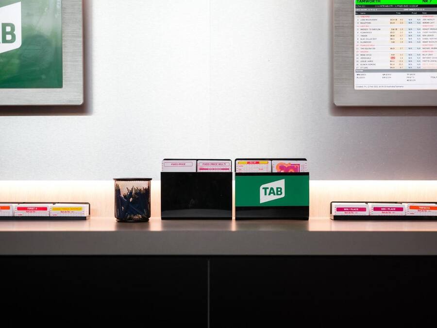 A table with a green box labeled 'TAB' and several other boxes with labels like 'TRIFECTA' and 'FIRST 4'.