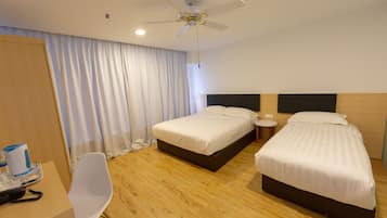 Deluxe Family Queen Room | Desk, blackout drapes, iron/ironing board, free WiFi
