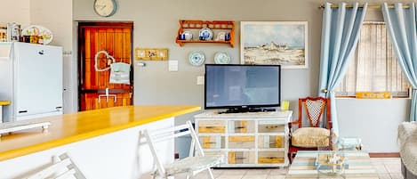 Departamento familiar | Sala de estar | Televisión de plasma de 42 pulgadas con canales por cable y televisión