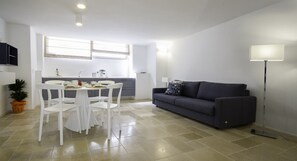 Suite de lujo | Sala de estar | Televisión de pantalla plana 