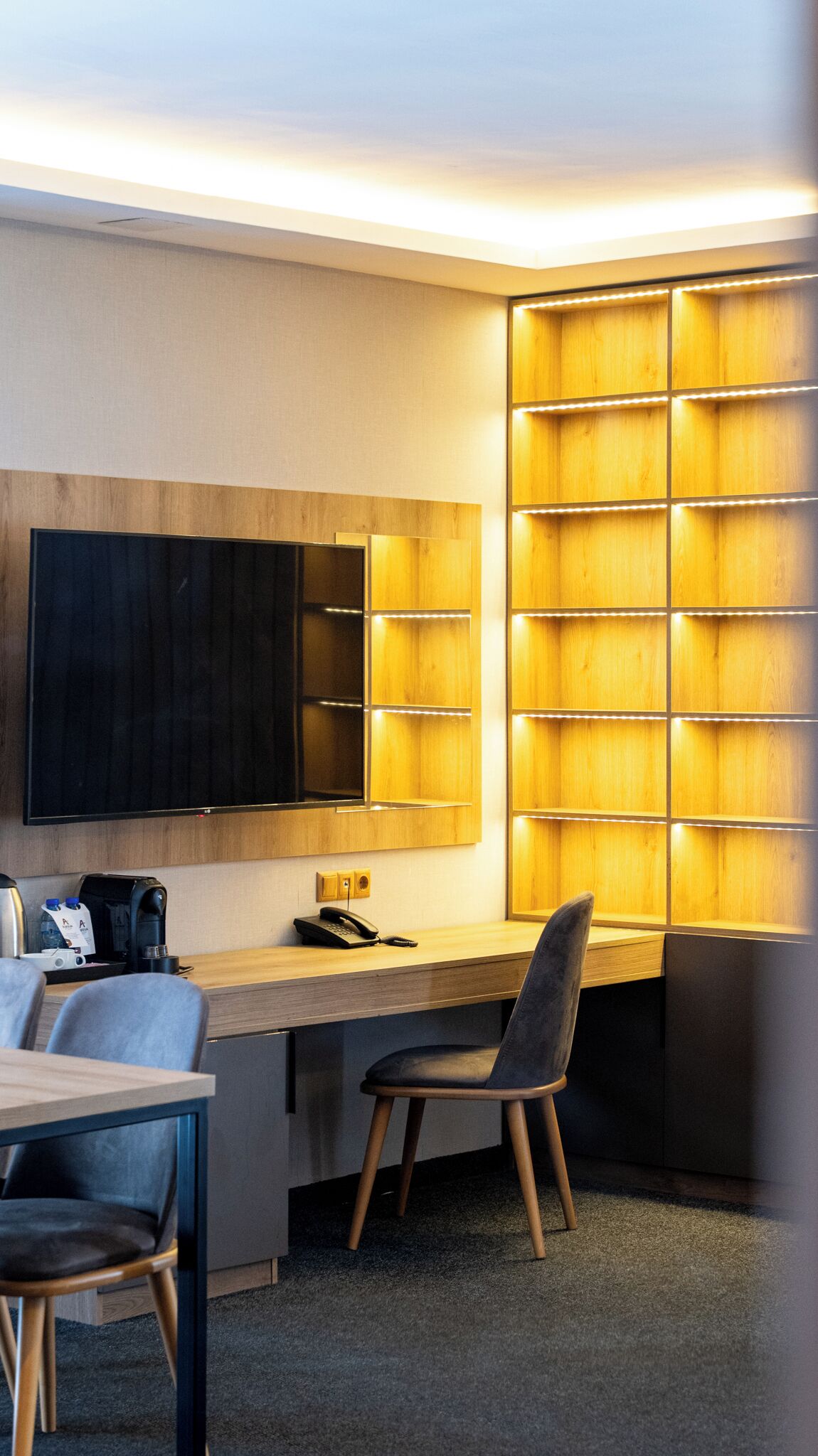 deluxe apartment | living area | flat-screen tv