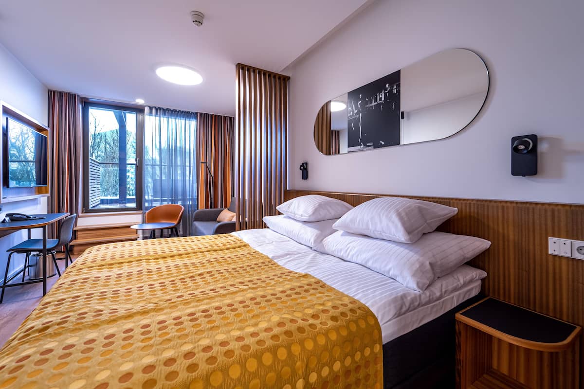 Superior Room | Minibar, in-room safe, desk, blackout curtains
