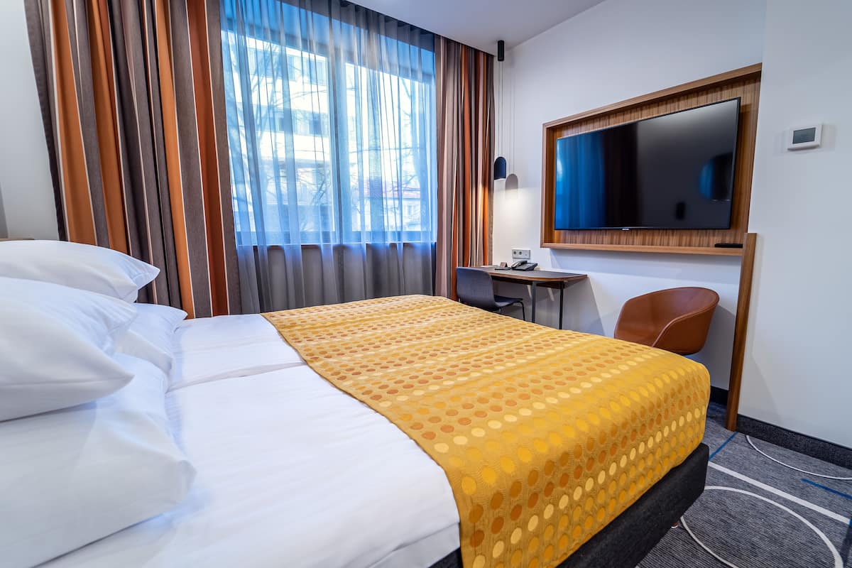 Standard Double or Twin Room | Minibar, in-room safe, desk, blackout curtains