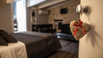 Deluxe Room | Desk, laptop workspace, blackout curtains, rollaway beds