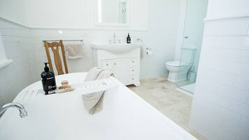 Mason Suite | Bathroom | Separate tub and shower, deep soaking tub, rainfall showerhead