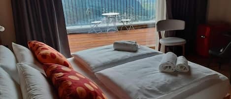 Premium bedding, down duvets, memory-foam beds, minibar