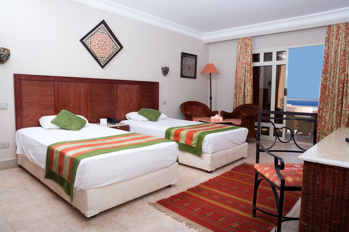 Basic Double or Twin Room | In-room safe, iron/ironing board, free cribs/infant beds, bed sheets