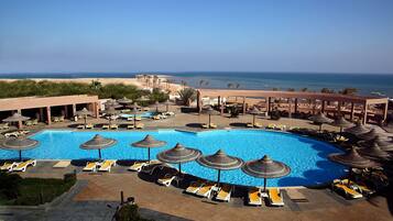 2 outdoor pools, pool umbrellas, pool loungers
