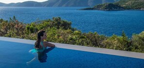 Seasonal outdoor pool, pool umbrellas, sun loungers