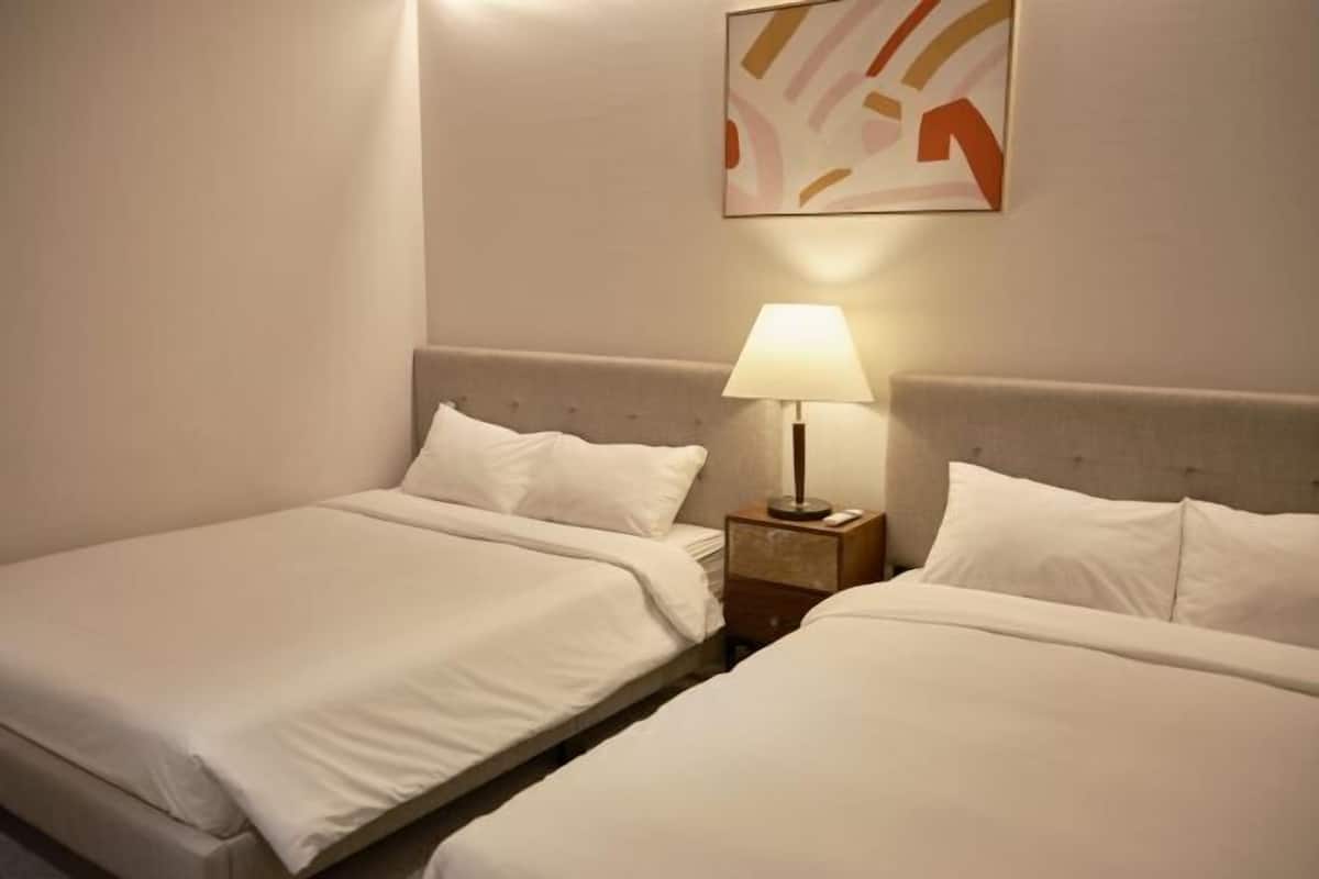 2 bedrooms, laptop workspace, blackout drapes, iron/ironing board