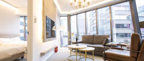Main Building Suite (Randomly Selected) | Living area | 43-inch flat-screen TV with cable channels, Netflix, streaming services