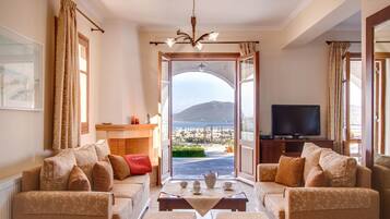 Luxury Villa, 3 Bedrooms, Private Pool, Sea View | Living room | Flat-screen TV, fireplace, DVD player