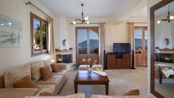 Luxury Villa, 3 Bedrooms, Private Pool, Sea View | Living area | Flat-screen TV, fireplace, DVD player