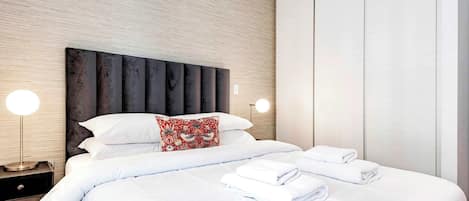 2 habitaciones, tabla de planchar con plancha, wifi y ropa de cama