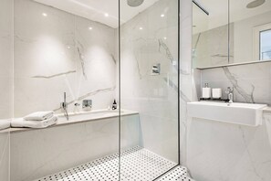 Bathtub, hair dryer, towels