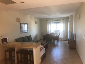 Apartment, 2 Bedrooms | Living area | TV