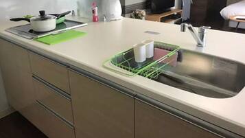 Fridge, microwave, stovetop, cookware/dishes/utensils