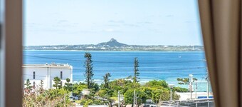 オーシャンビュー貸別荘、海洋博公園エメラルドビーチ入口まで徒歩３分、BBQ設備無料提供清掃料不要 / 国頭郡 沖縄県