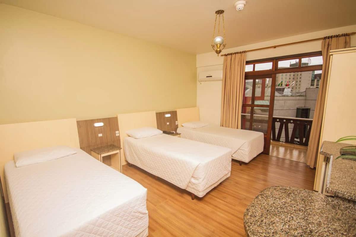standard room, 3 single beds | 1 bedroom, minibar, desk, laptop workspace