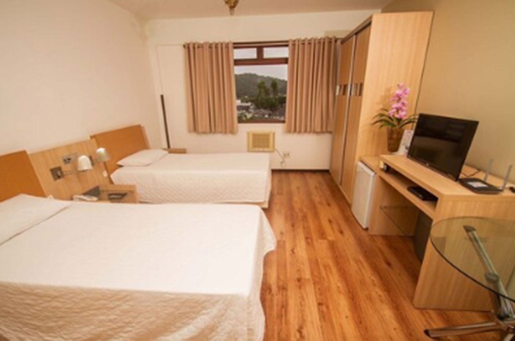 Minibar, desk, laptop workspace, blackout curtains