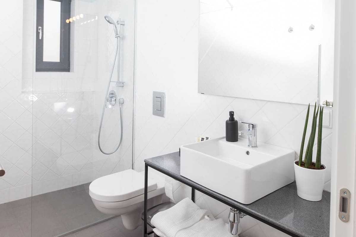 junior suite, balcony | bathroom | shower, bathrobes, slippers, towels