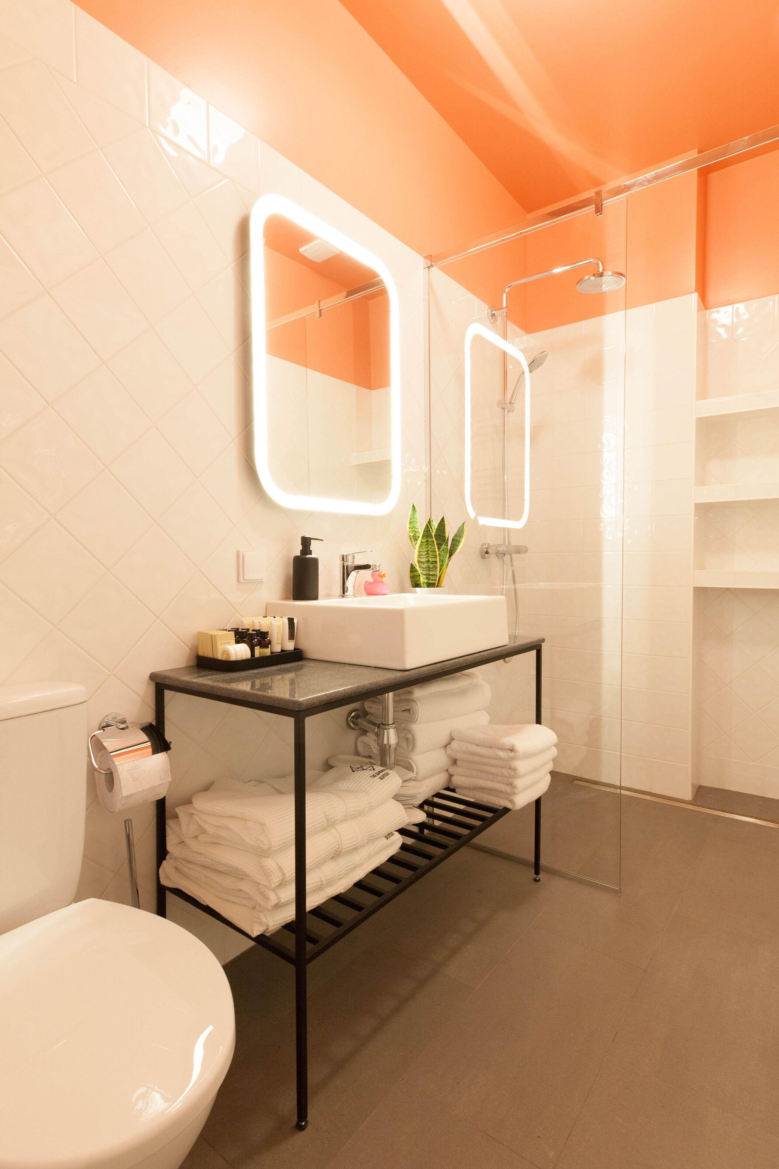 executive suite | bathroom | shower, bathrobes, slippers, towels