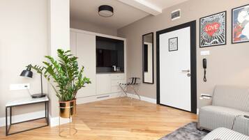 Junior Suite, Balcony | Living area | 49-inch LED TV with digital channels, TV