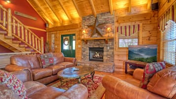 42-inch TV with cable channels, fireplace