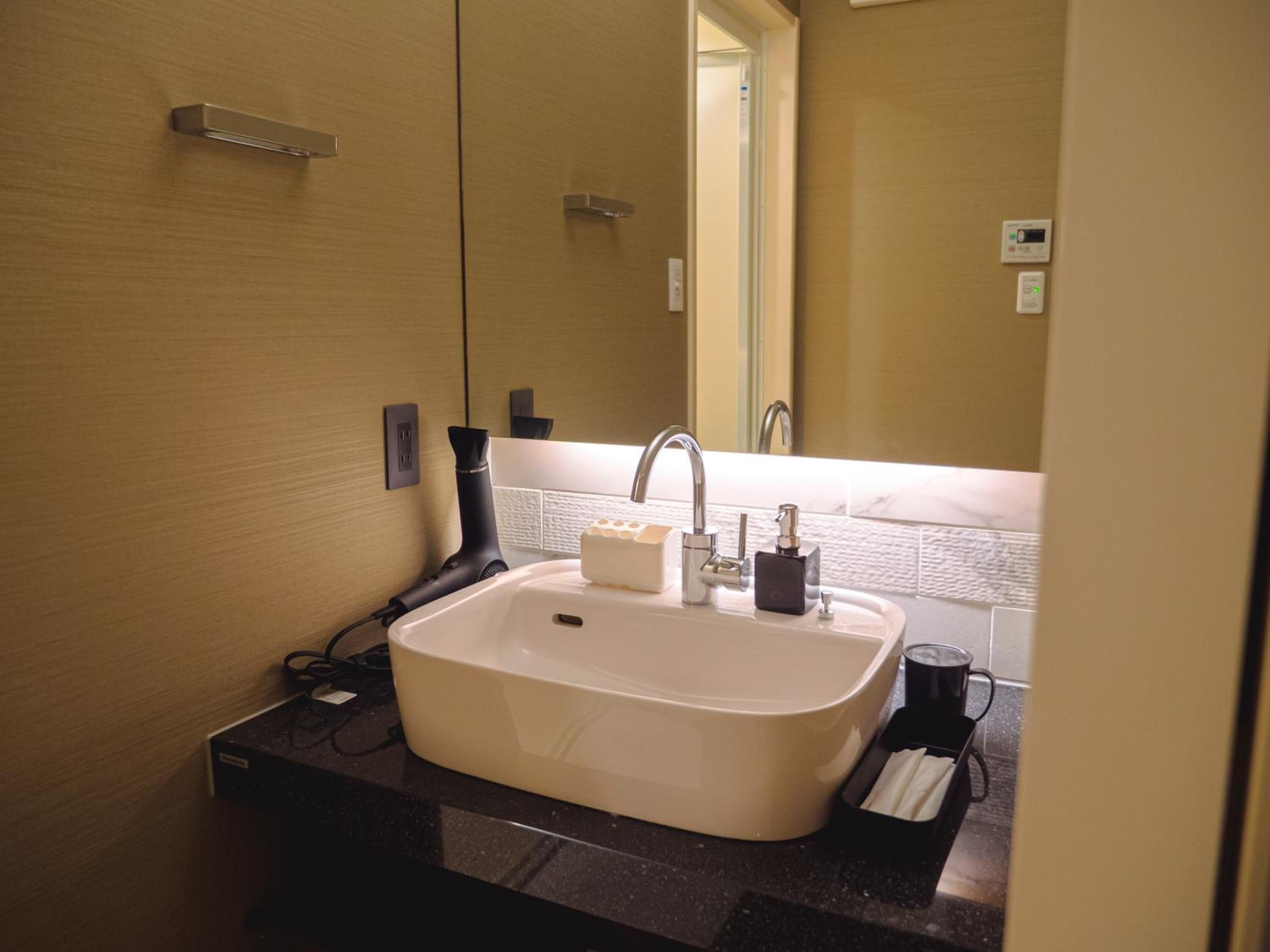 free toiletries, hair dryer, slippers, bidet