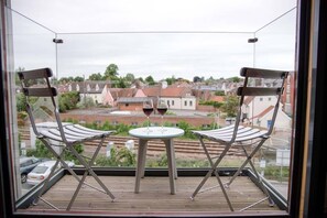 Apartamento (2 Bedrooms) | Opções para refeição ao ar livre