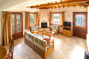 Ferienhaus, 1 Schlafzimmer | Wohnbereich | Flachbildfernseher