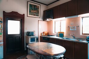 Fridge, microwave, cookware/dishes/utensils