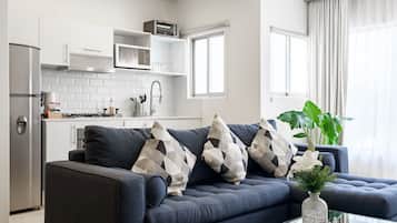 Deluxe Apartment, 2 Bedrooms | Living area | LCD TV