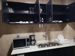 Phòng Suite Deluxe | Bếp riêng | Tủ lạnh, lò vi sóng, lò nướng, bếp nấu 
