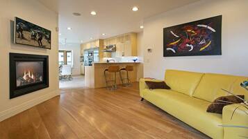 Smart TV, fireplace, books, offices