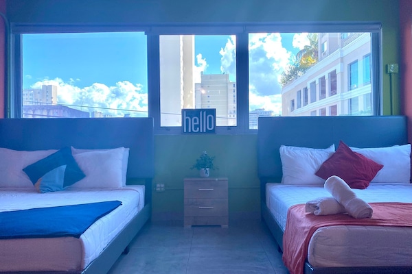 Habitación Deluxe, 2 camas Queen size | Decoración personalizada, wifi gratis y ropa de cama