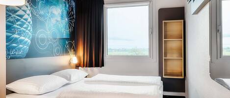 Literie de qualité supérieure, chambres insonorisées, draps fournis