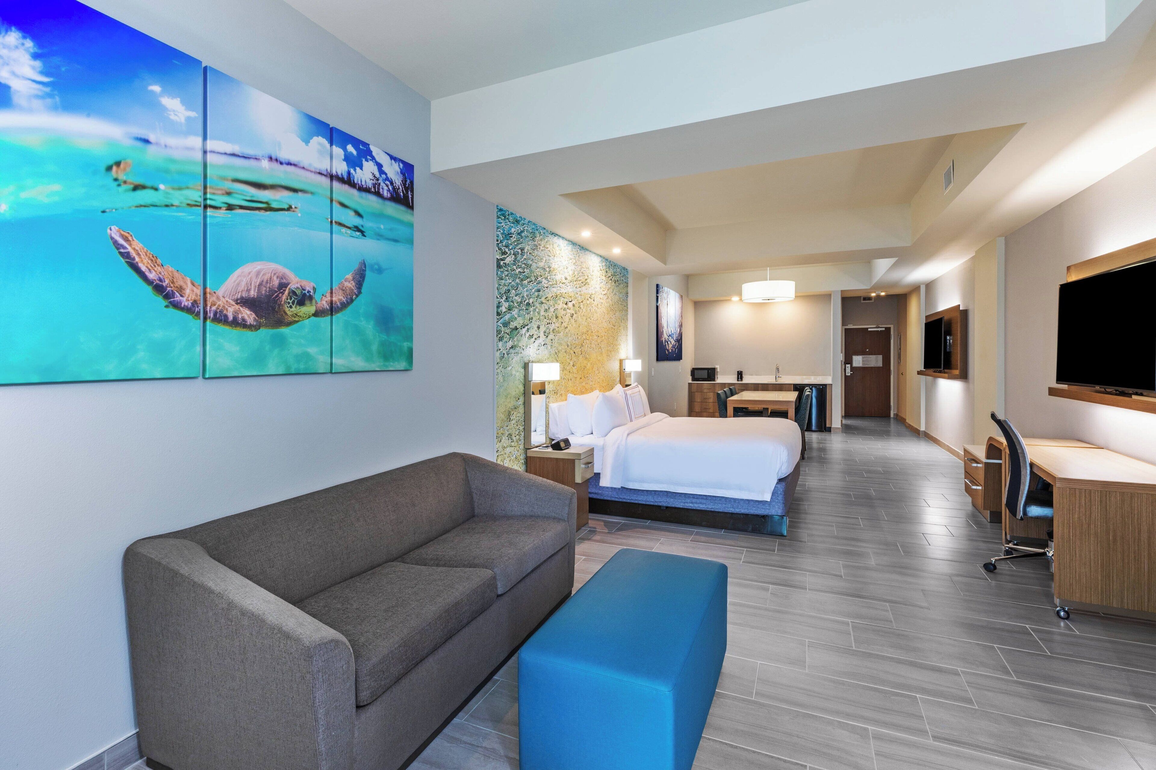 Suite, 1 King Bed with Sofa bed, Balcony | Pool | Outdoor pool, open 9:00 AM to 10:00 PM, pool umbrellas, sun loungers
