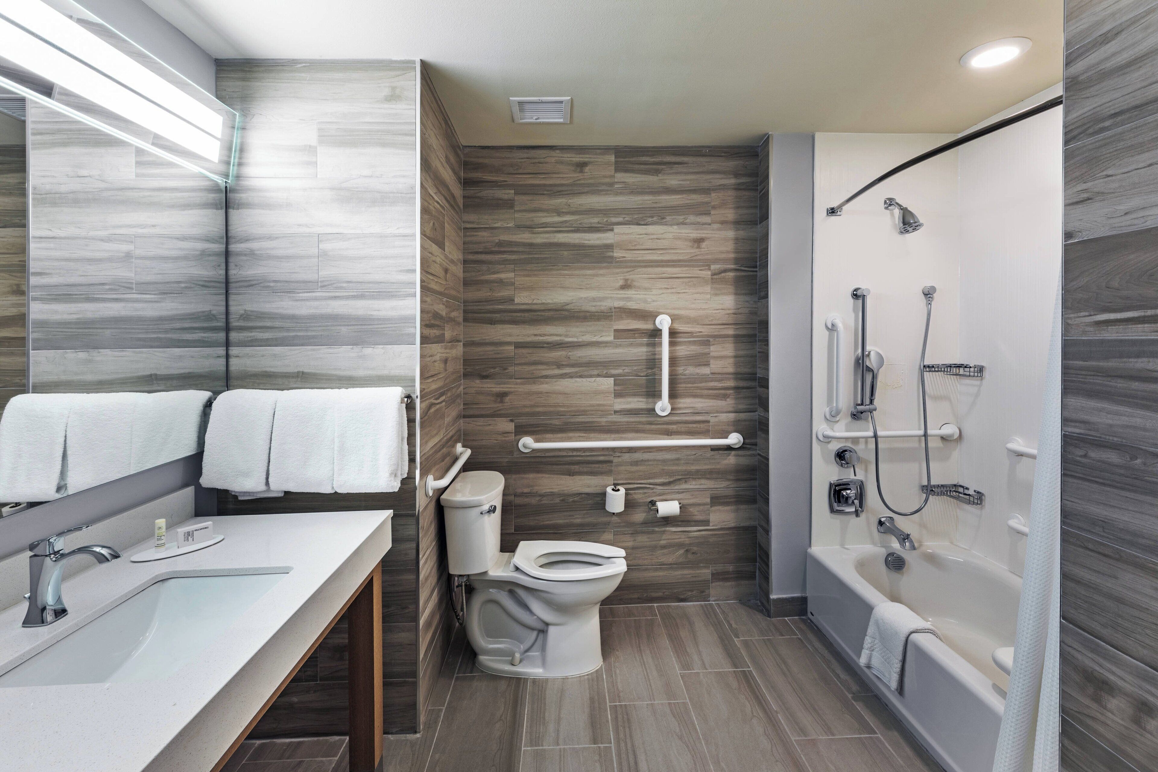 combined shower/bathtub, free toiletries, hair dryer, towels