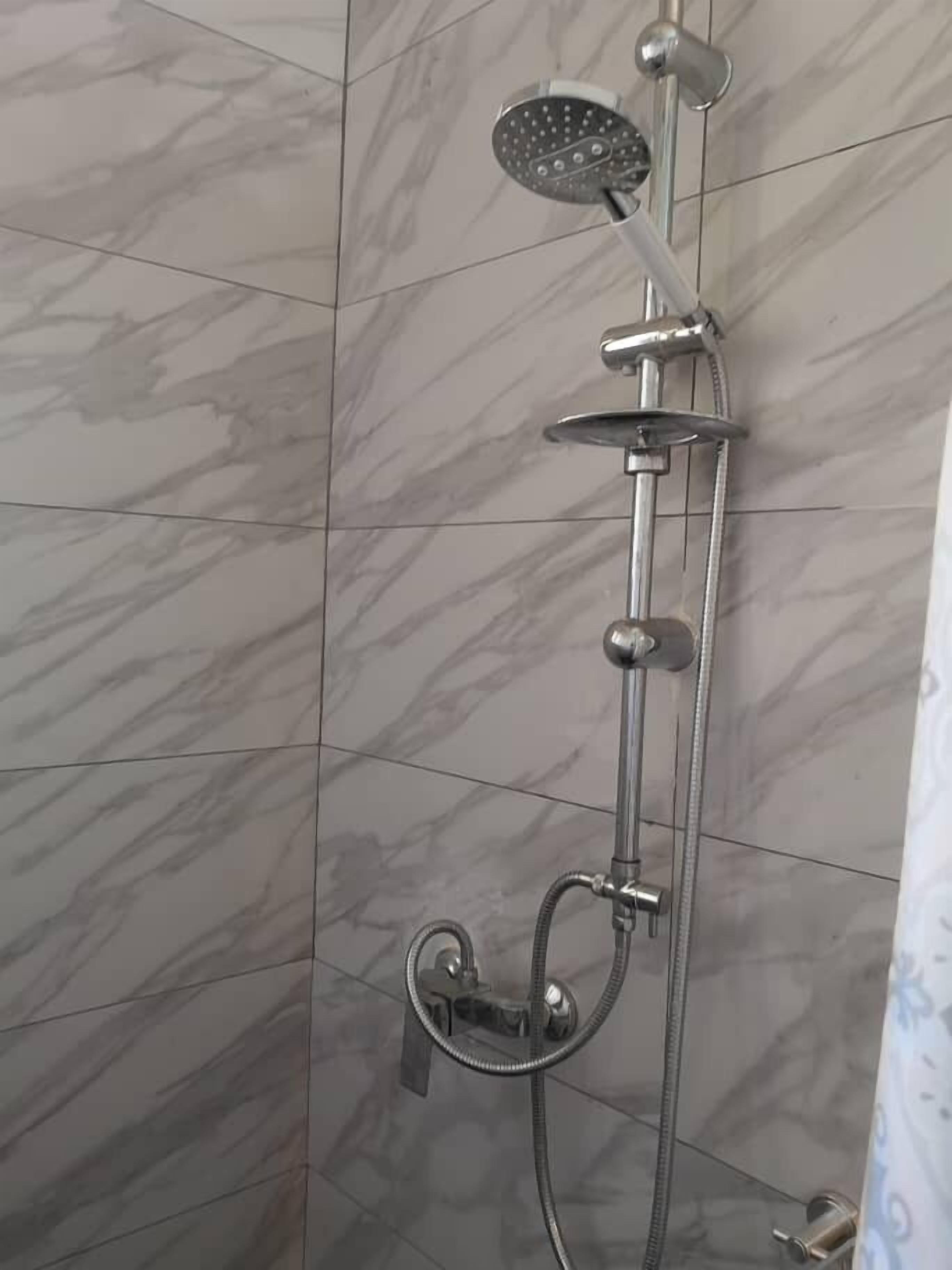 Studio Deluxe | Buồng tắm vòi sen