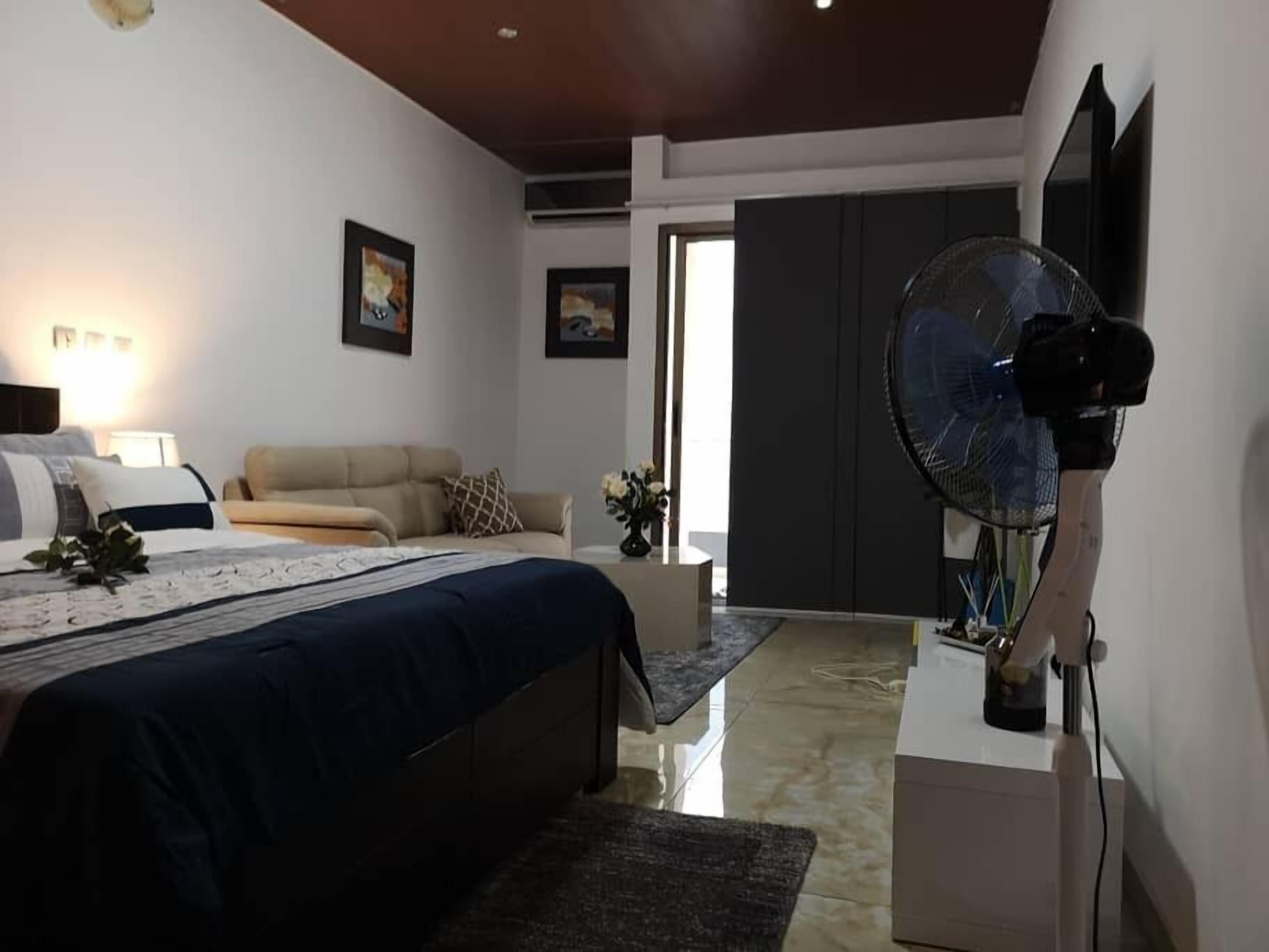 Deluxe Studio | Individually decorated, individually furnished, blackout drapes