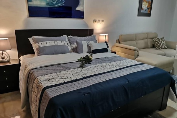 Deluxe Studio | Individually decorated, individually furnished, blackout drapes